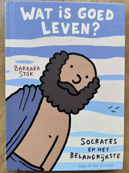 voorkant van het boek met tekening van Socrates, met kale kop, baard en een doek die zijn lichaam half bedekt