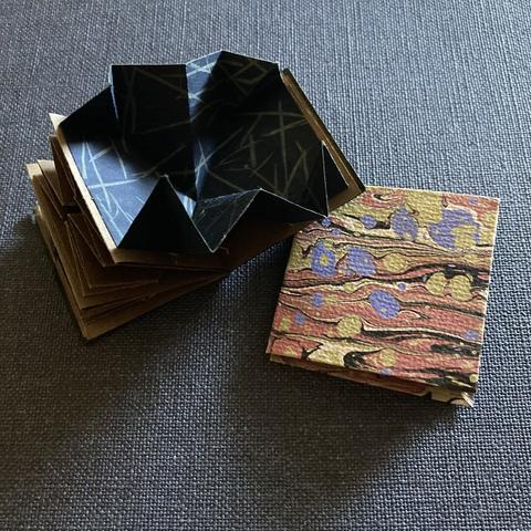 two small accordion Turkish map fold books made with dyed paper lunch bags