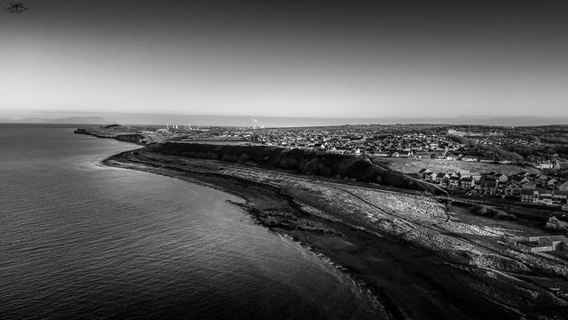 Aerial Monochrome shot along open coast line