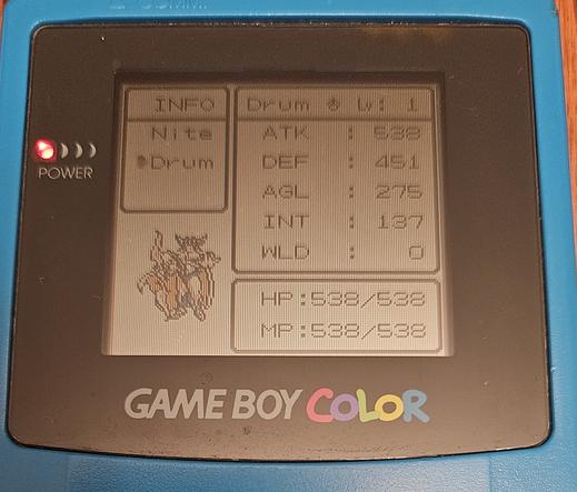 Photo of a game boy colornwith dragon warrior monsters showing stats for a level 1 Dark Drium
