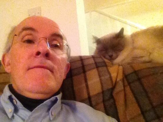 a male person and a male cat