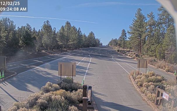 Use this webcam to help time your South Rim arrival. During fall weekends and holidays, there can be long lines and up to two hour wait times between 10 am and 4 pm. This view refreshes every 5 minutes. Be sure to check the time and date in the image, to be sure it is current.

The entrance station is about 1.6 miles (2.5 km) north of the gateway town of Tusayan, Arizona, and 4.9 miles (7.8 km)  south of Grand Canyon Visitor Center.