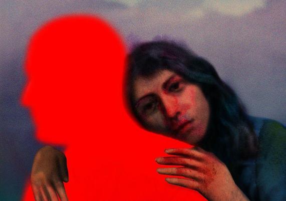 A warm embrace is depicted, with one person outlined in vivid red against a dreamy, blurred background of soft colors.