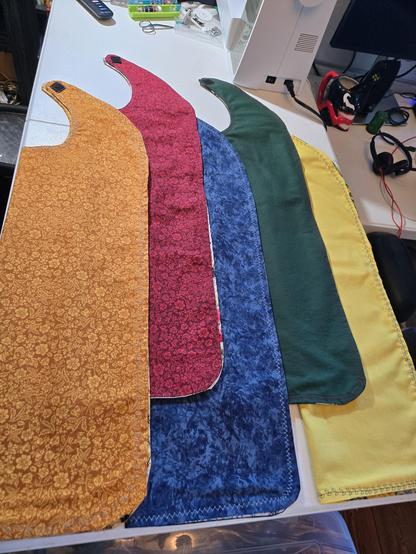 Other side of bibs- left to right- 

Deep gold yellow with lighter golden yellow floral print

Dark red with lighter red floral print

Stonewashed style blue in various shades

Dark forest green

Sunshine yellow