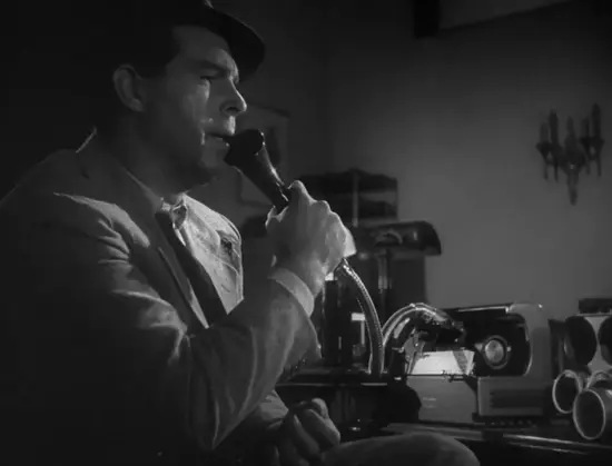 Screenshot from Double Indemnity (1944)

Walter dictates a memo into the horn microphone of a wire recorder