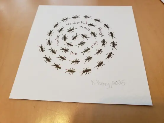 Hand drawn generative/procedural art in ink on watercolor paper. The abstract pattern looks like a spiral of ants with some words that say "move slow and make wonderful things"