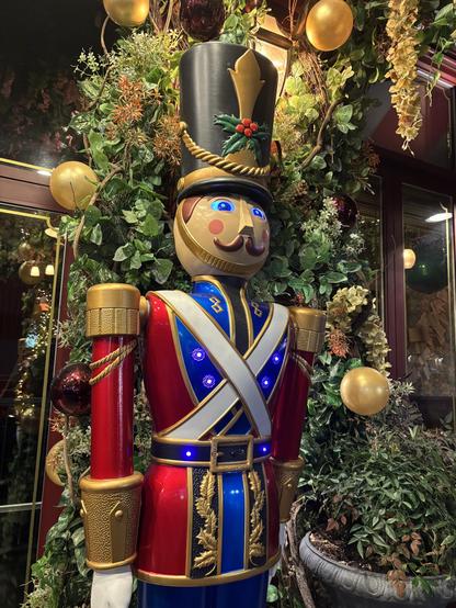 Toy soldier on the right is plugged in! His eyes, buttons light up.