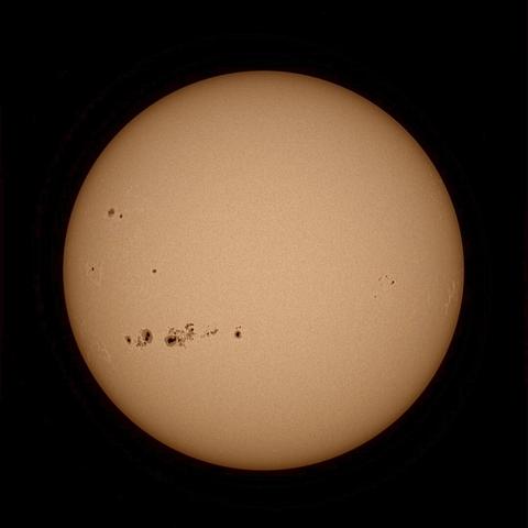 The Sun photographed today Dec 3rd 2025 from North Oxfordshire in the UK. There are two very large sunspots visible in the lower left third of the suns disk. To the right is a smaller sunspot, but still the size of Earth. Lots of granulation is also visible on the ‘surface’ of the Sun