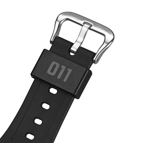 Detall de la corretja on es pot veure el gravat 011