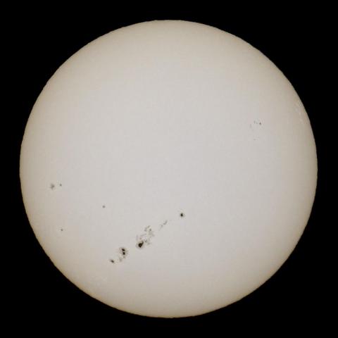 Picture of the Sun on December 3 2025, with a large sunspot group in the lower part of the image.
