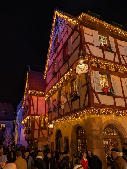 medieval half-timbered building with lots of halogen lights