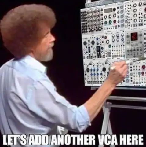 a screenshot of bob ross from one of his shows, except that instead of a painting in front of him, it's a modular synth looking a lot like a vcvrack screen.
the text says "Let's add another VCA here"