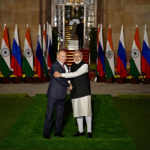 President Vladimir V. Putin of Russia and Prime Minister Narendra Modi of India greeting each other before a meeting in New Delhi in 2021.