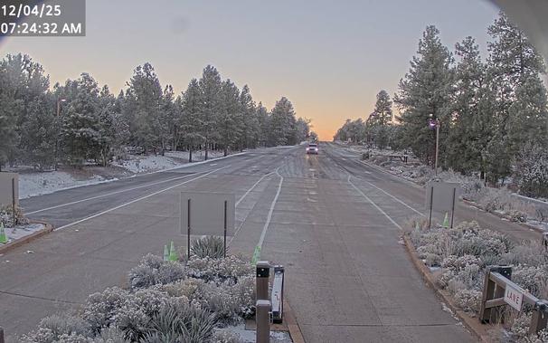 Use this webcam to help time your South Rim arrival. During fall weekends and holidays, there can be long lines and up to two hour wait times between 10 am and 4 pm. This view refreshes every 5 minutes. Be sure to check the time and date in the image, to be sure it is current.

The entrance station is about 1.6 miles (2.5 km) north of the gateway town of Tusayan, Arizona, and 4.9 miles (7.8 km)  south of Grand Canyon Visitor Center.