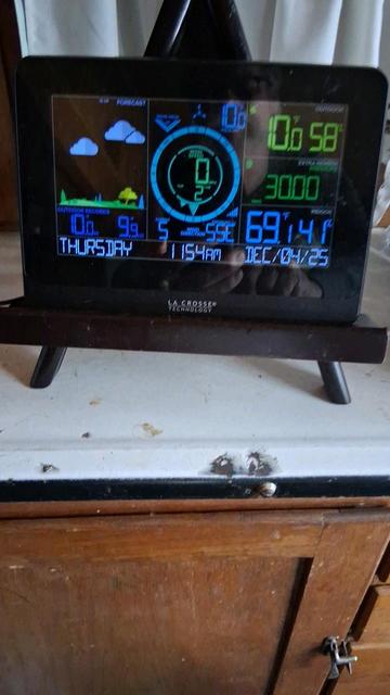 Weather station showing temperature at 10°F.
