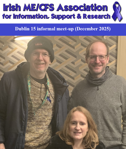 Photo of 2 men standing and one woman sitting