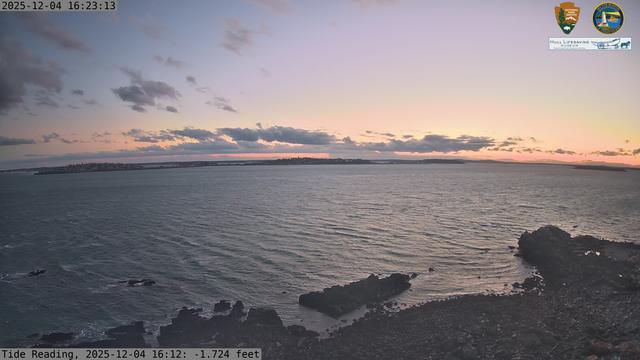 Camera looking south from Boston Light on Little Brewster Island. View looks toward the town of Hull across the Nantasket Roads shipping route from the island.