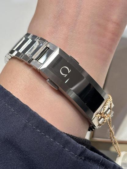 Showing the elongated and angular clasp