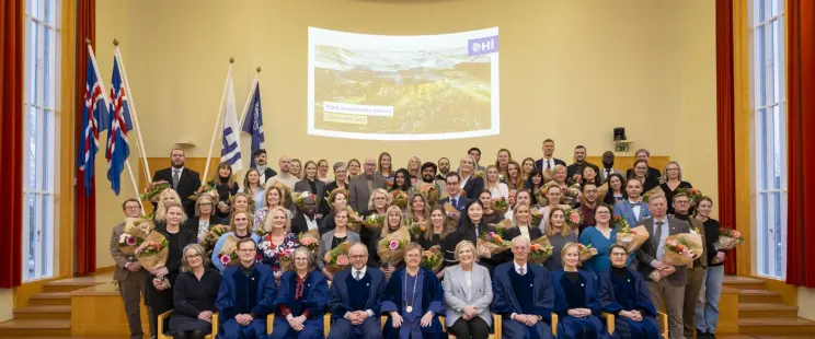 Group picture of rector, president other dignitaries and the newly minted PhDs from University of Iceland