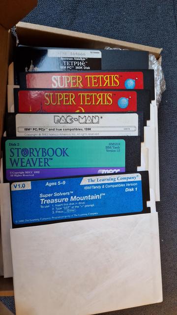 5.25 inch floppy disks for games such as tetris, Pac-Man, storybook weaver, and super solver treasure mountain