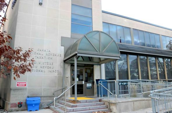 Photo taken outside of the front doors of the Tax Services Office on Fredrick Street in Kitchener, Ontario.