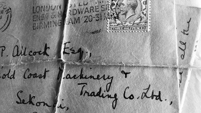 Bound stack of letters in envelopes.