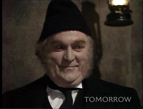 The Rutan scout, in the shambling elderly form of the lighthouse keeper Reuben, grins terrifyingly, apparently for the first time ever.