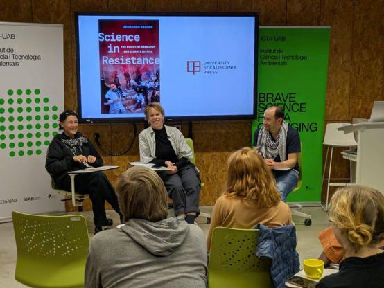 A photo of the panel at ICTA-UAB featuring a reading of my book and a conversation with a member of Boycott ICL