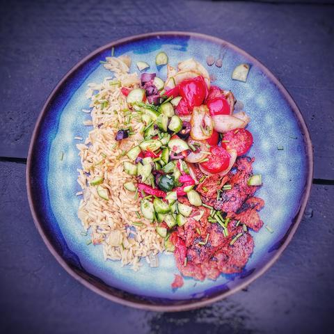 Chicken kebab with veggies and rice from top