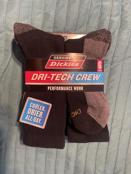 This is a photo of a six pack of Dickies Dri-Tech Crew performance work socks in black.