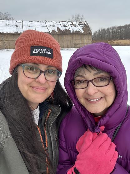 Selfie with my mom, Longhouse in the background