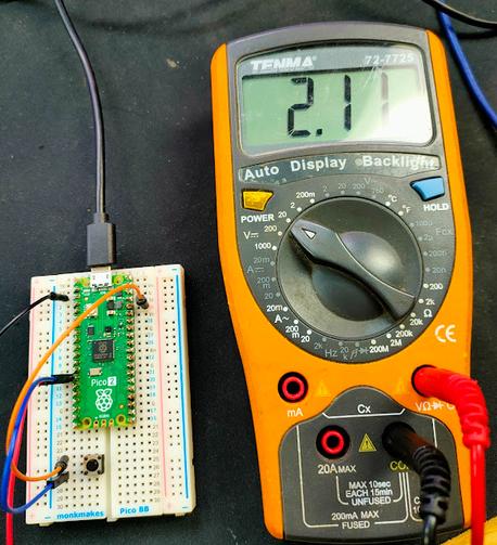 pico and button with setup of internal pull down resistor. The reading in multimeter shows high even when no button is pressed