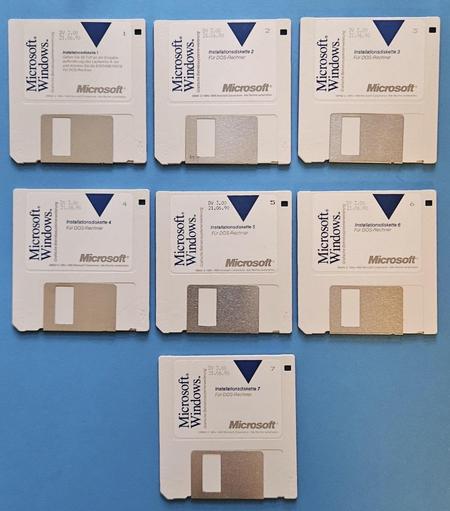 A floppy disk set of Windows 3.0.