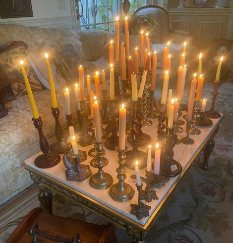 collection of (lit) candlesticks