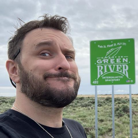Me on a road trip stopping by the Green River Intergalactic Spaceport in Green River, Wyoming.