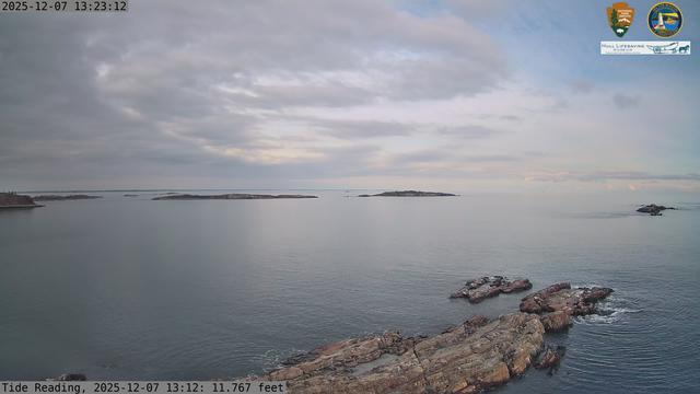 Camera looking north from Boston Light on Little Brewster Island. View looks toward the northern approaches into Boston Harbor, with Graves Light visible into the distance. The smaller Brewster Islands, Middle and Outer, are in the midground, with the Shag Rocks on the near right.