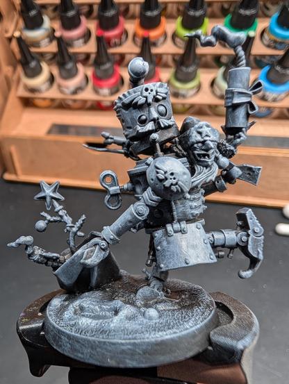 Photo of the 2025 Da Red Gobbo mini atop a paint handle.