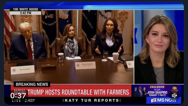 A televised discussion featuring Pres Trump at a roundtable with 2 women *shown. The setting is formal, with the flags of the United States and various military branches displayed in the background. A news ticker at the bottom: Trump hosts roundtable with farmers: