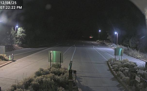 To help time your South Rim arrival, monitor the South Entrance Station Webcam. During busy weekends, there can be long lines and up to two hour wait times between 10 am - 5 pm. This view refreshes every minute. The entrance station is about 1.6 miles (2.5 km) north of the gateway town of Tusayan, AZ.