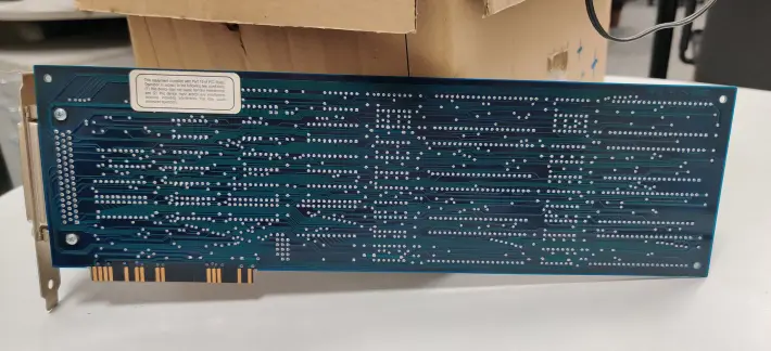Back side of an extension board showing traces.