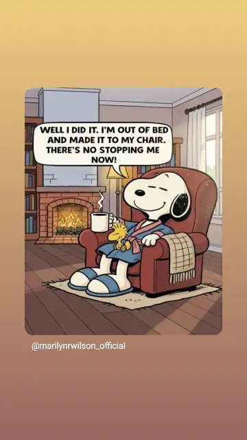 Snoopy sitzt im Morgenmantel im Sessel am Kamin, in der Pfote einen Kaffee und Woodstock auf seinem Schoß.
Text: well, I did it, I'm out of bed and made it to my chair. There's no stopping me now!