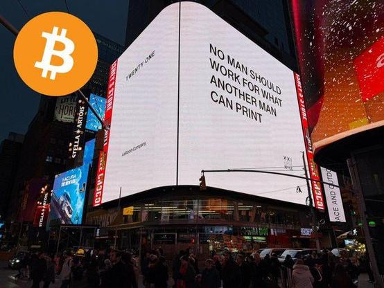 Giant Bitcoin ad spotted in Times Square - "No man should work for what another man can print"