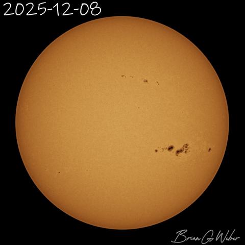 Sun image from 2025-12-08 showing the massive sunspot band two-thirds of the way toward the right edge of the disc.