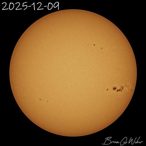 Sun image from 2025-12-09 showing the massive sunspot approaching the right edge of the disc.