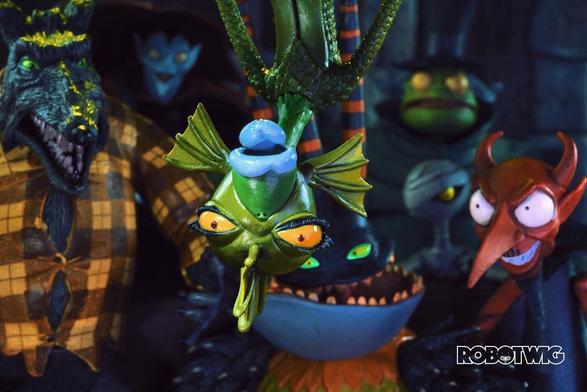 Undersea Gal appears from the ceiling looking at the present that Jack is showing the people of Halloween Town