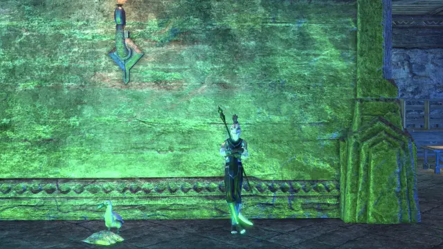 elder scrolls online screenshot. my white vampire argonian, dressed in black with green and blue accents, leans against a stone wall. beside him is a white auk like bird and a pile of fish on the ground. neon green light illuminates the scene.