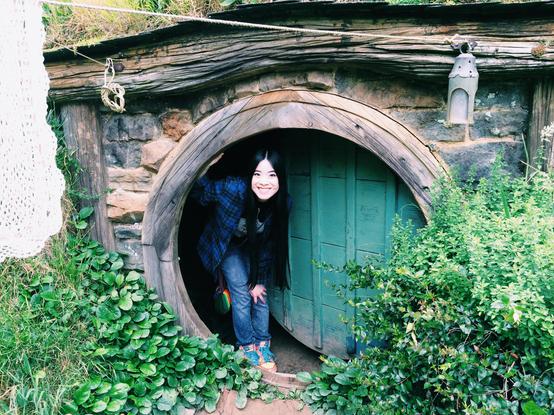 2014 iPhone 5s photo of Chicago artist Jenny Lam in a Hobbit hole in Hobbiton movie set, Matamata, New Zealand