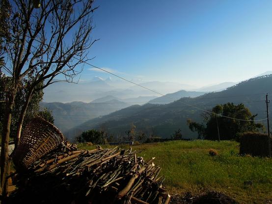 Photograph of a mountainous landscape in Nepal. By Tobias Federle under a free Unsplash license: https://bit.ly/4pcslCP.