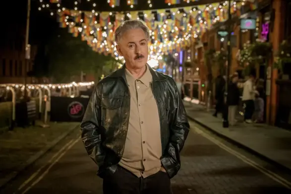 Alan Cumming plays Leo, a jovial bartender living in the Gay Village of Manchester.