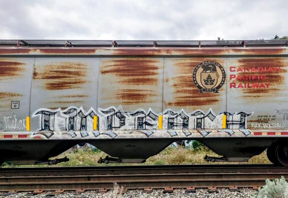 Train car with graffiti rolling through Kamloops BC Canada